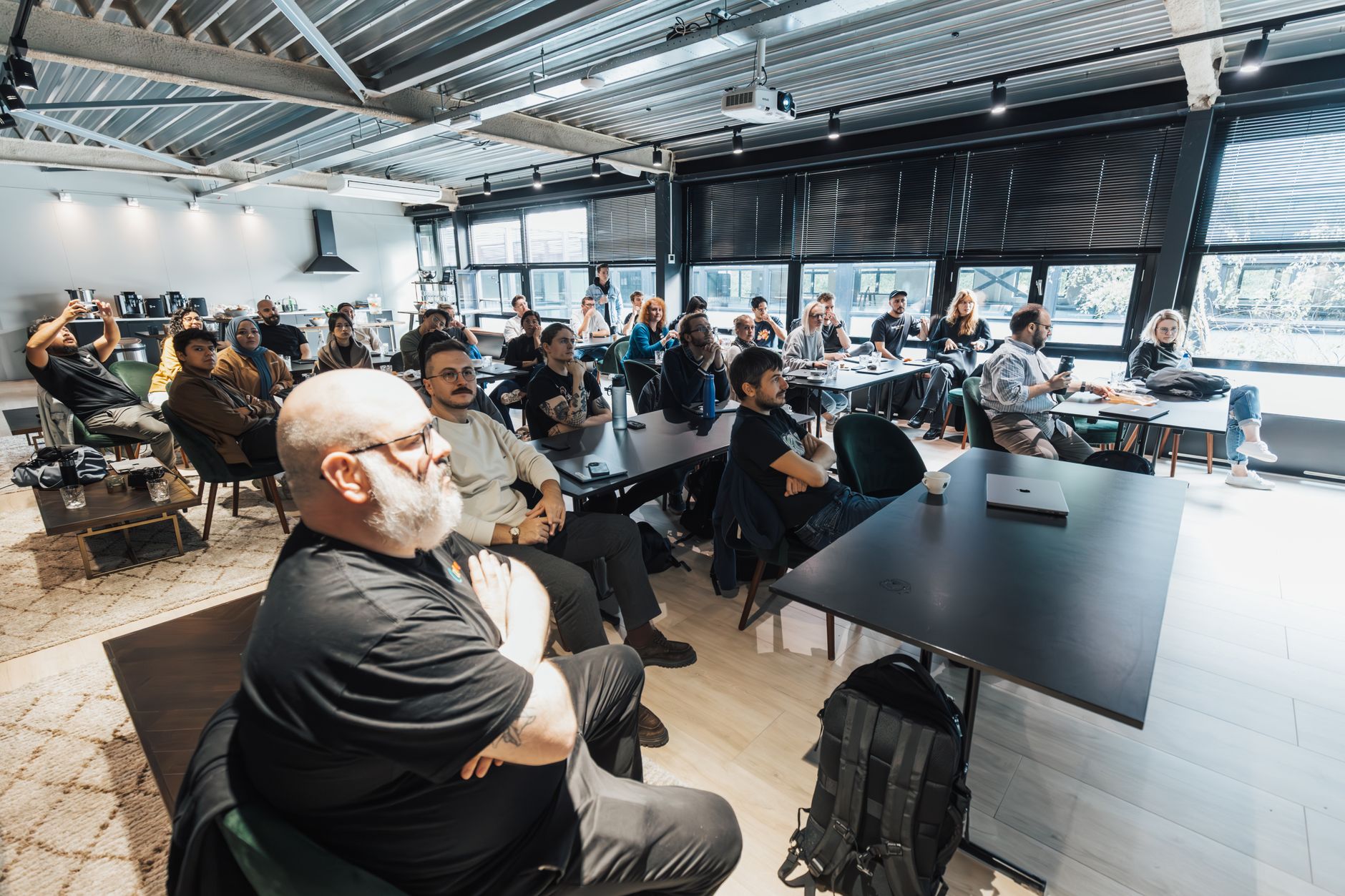 Colleagues at a UK company reviewing their carbon reporting and net-zero plan